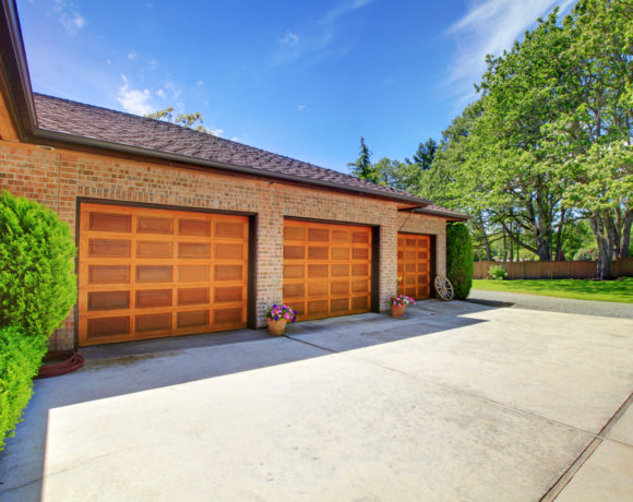Outside of a Home with a Garage Door Repair in OKC, Mustang, Edmond, Oklahoma City, El Reno & Surrounding Areas